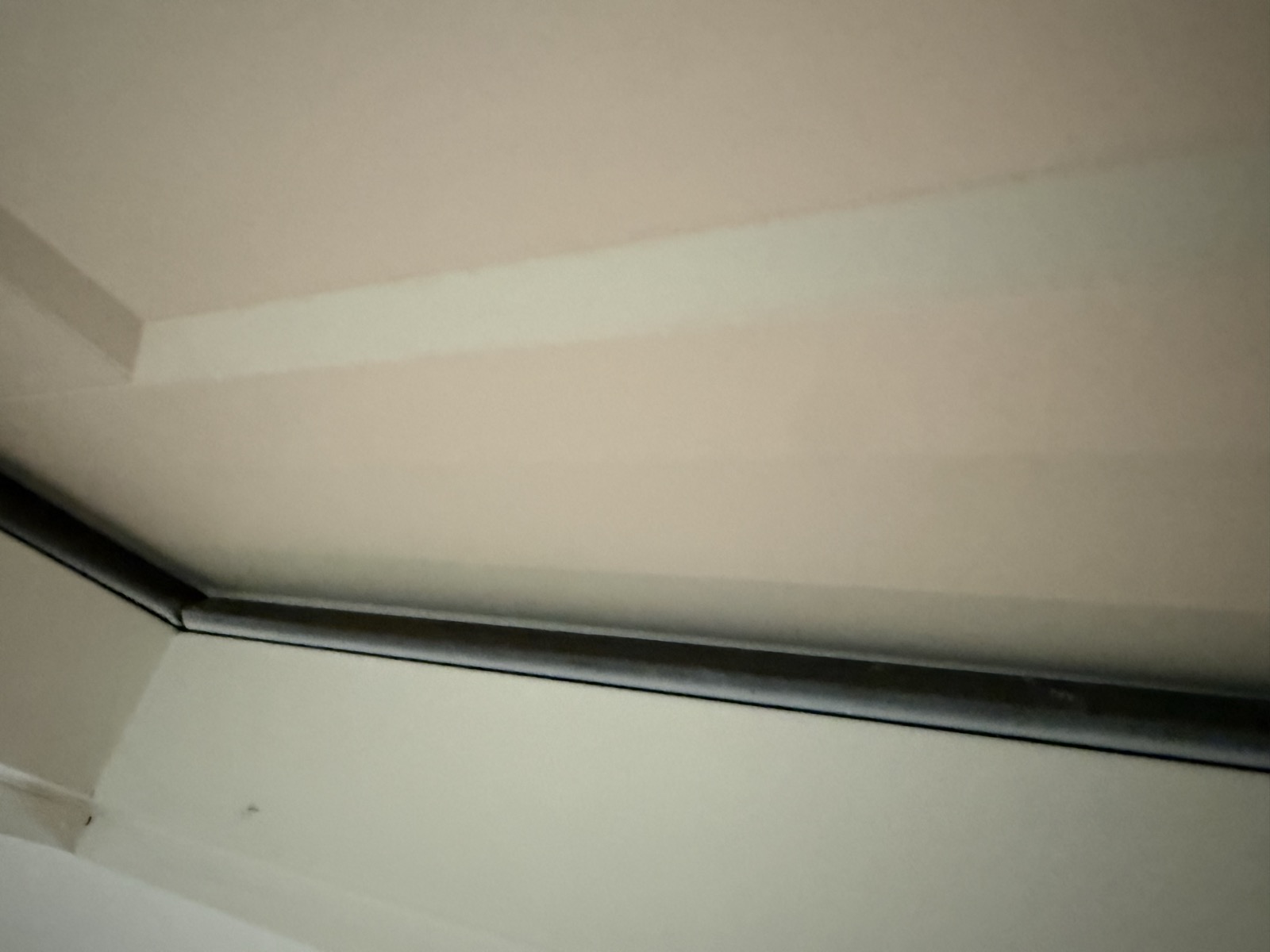 Daylight visible through a gap at a door edge