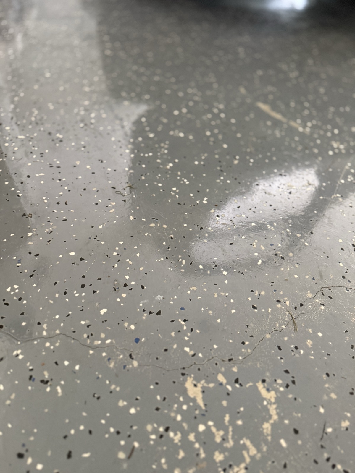 Peeling garage epoxy floor