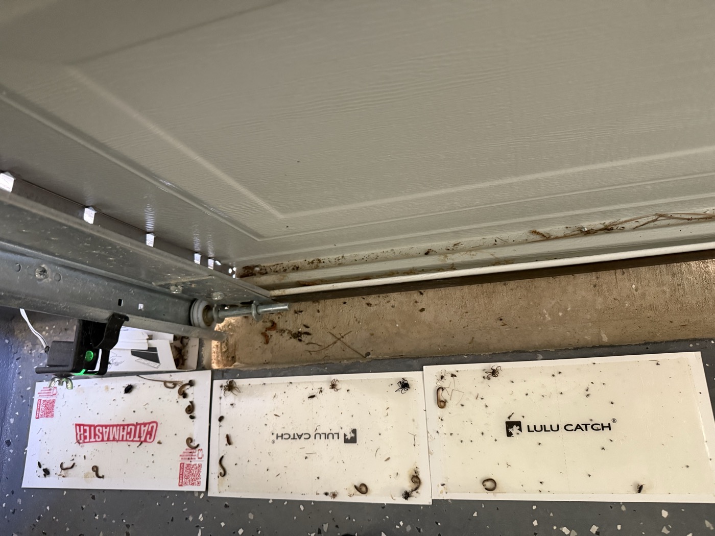 Garage doors excessively loud; weather-sealing owner-paid