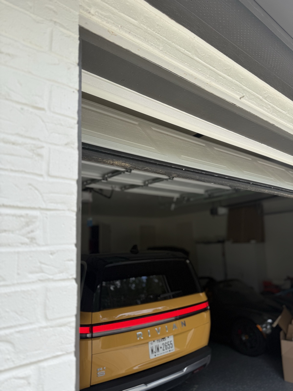 Garage doors don’t fully open — 7-ft tracks on 8-ft doors