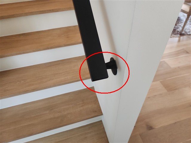 Stair handrail does not terminate to wall/newel