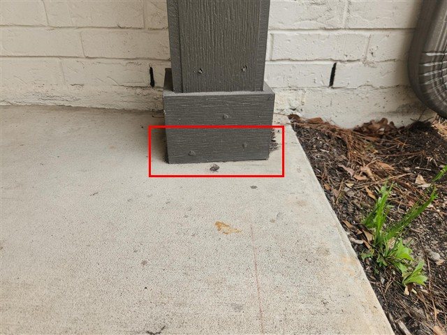 Porch column trim in direct contact with concrete