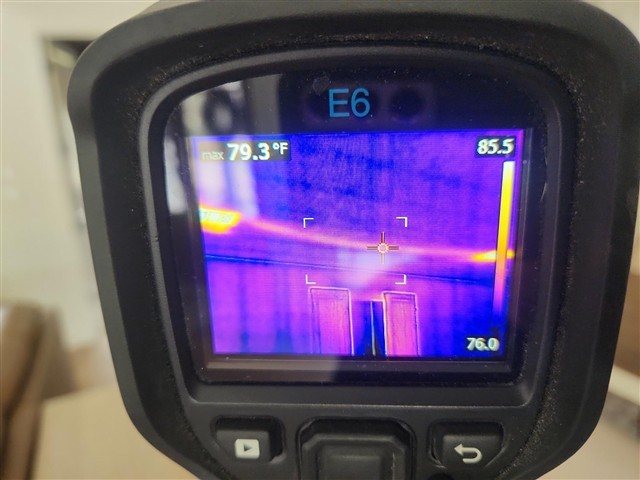 Duct resting on ceiling drywall (thermal anomaly)