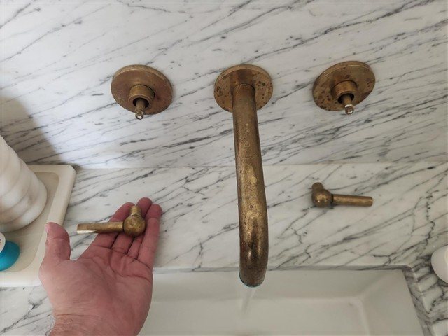 Master bath sink valve handles detached