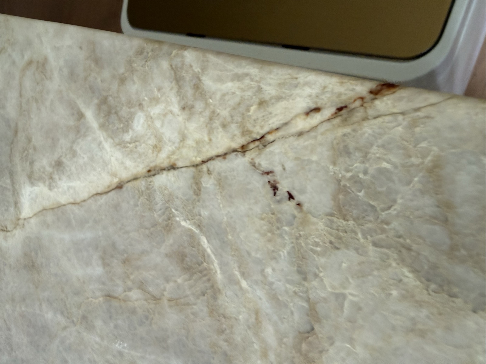 Crack with discoloration in a stone surface